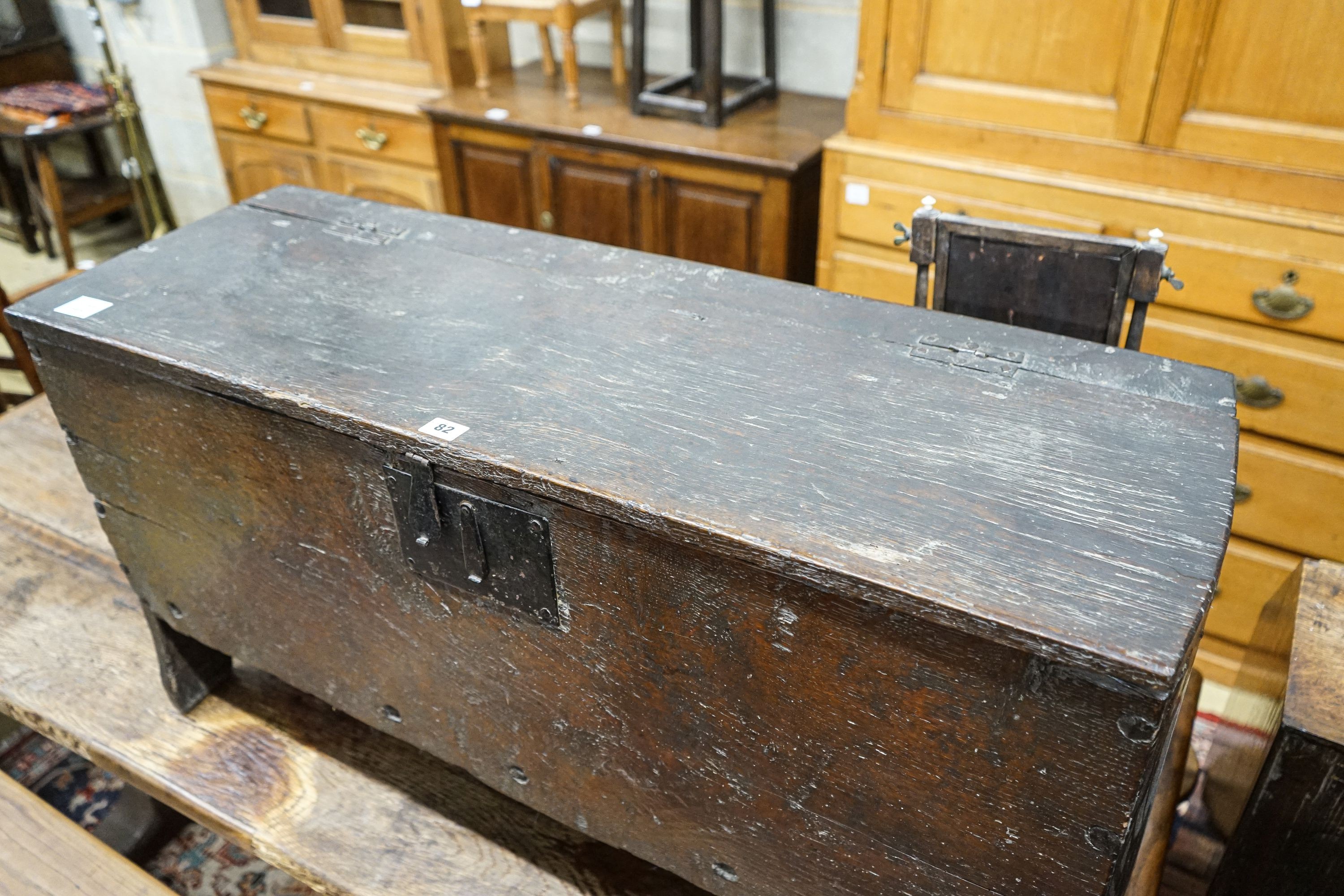 A 17th century oak and elm six plank coffer, width 104cm, depth 36cm, height 54cm